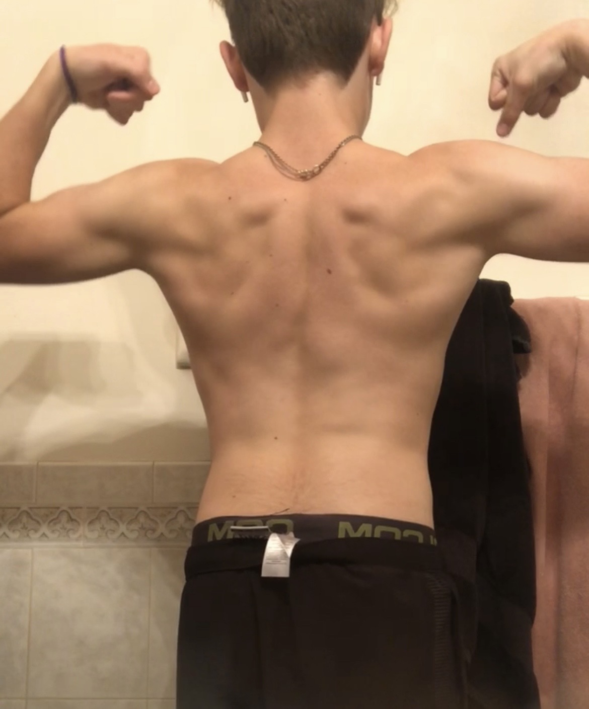 Porter before, back double biceps